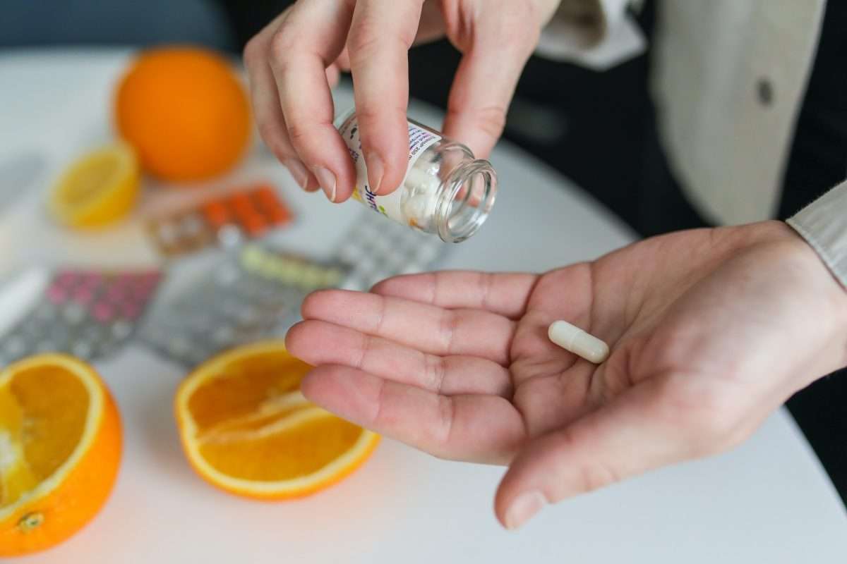 Do you really need supplements to boost immunity? 1 Man taking supplements to boost immunity